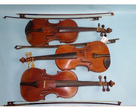 A full-size violin labelled Antonius Stradivarius, with two-piece back and replacement tuning pegs, in case with damaged bow,