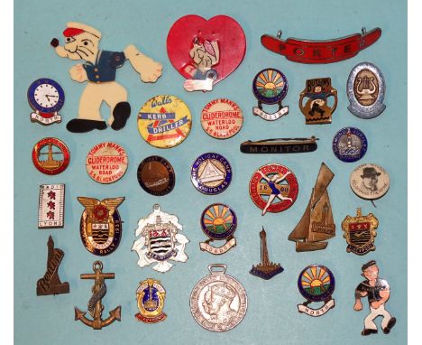 A collection of various enamel and plastic badges, including: 'Butlins 1938 Skegness', 'BBC Radio Circle', various Blackpool-