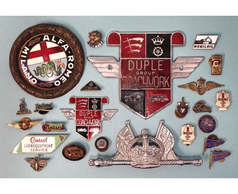 A collection of nineteen motoring-related enamel lapel badges, including: 'Speedwell Motor Oil (Running Made Easy)', 'Panther