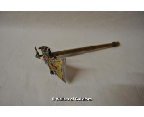 *Decorative miniature brass axe/hatchet, adorned with animals and red turquoise beads (Lot subject to VAT)