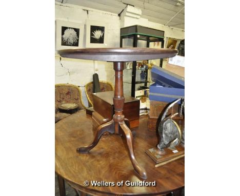 A George III mahogany tilt-top tripod table, 74cm diameter.