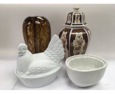 A mottled brown glass vase, ceramic jelly mould, vase and cover and a covered dish (4).