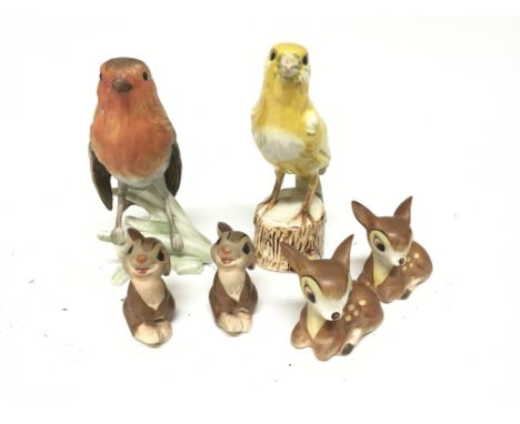 Four late 1950s W Goebel Disney animal figures and two Goebel bird ornaments.