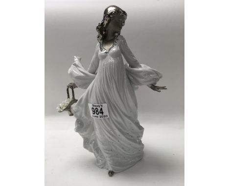 A large Lladro figure titled Spring Splendor. H.30cm. Boxed.