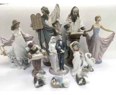 A collection of Lladro figures comprising some religious interest examples, animals etc.