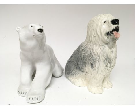 A large Beswick ceramic figure of a seated Old English sheep dog height 29cm and a Russian figure in the form of a polar bear