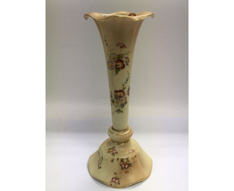 A blush ivory Royal Worcester trumpet shaped vase painted with floral sprays, approx 29cm.