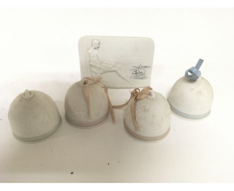 Four Lladro bells and a Lladro collectors plaque approx height of plaque 10cm bells 7cm all four appear to be in good conditi