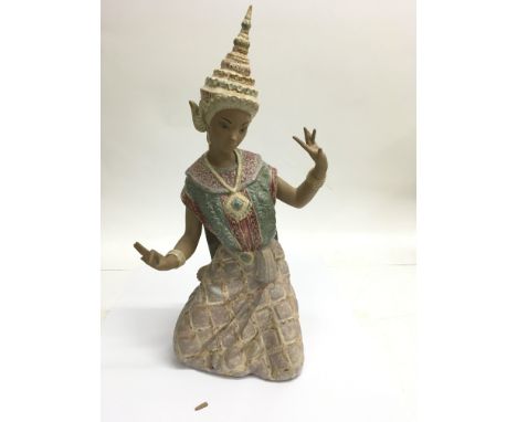 A large Lladro matt glaze figure of a Siamese dancing girl, lacking one finger.Approx 45cm high - NO RESERVE