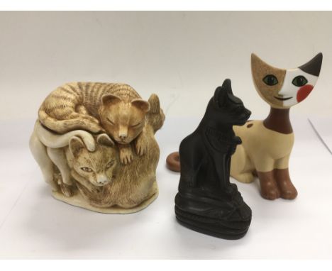 An unusual Goebel figure of a cat, signed, plus a lidded figural pot depicting cats and one other (3).