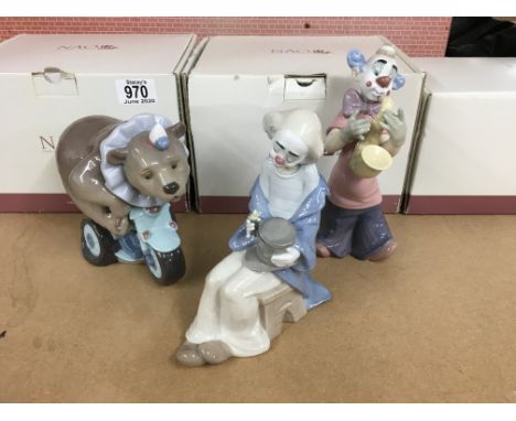 3 NAO porcelain clown figures with boxes.