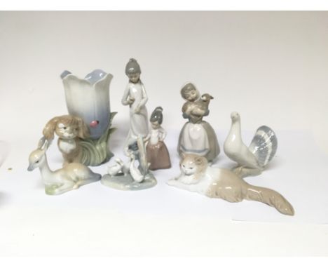 Various ceramics made in style of Lladro and NAO. Approx height 26 cm &lt; All appear to be in excellent condition (8)