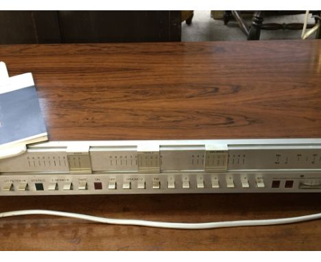 A Bang &amp; Olufsen Beomaster 3000-2 Type 2402 with a steel dial face and rosewood casing With instructions sold with a late