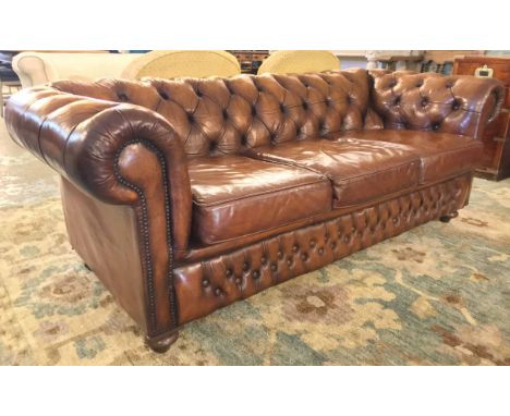 CHESTERFIELD SOFA, Victorian style three seater with deep button upholstered back and arms all in hand finished leaf brown le