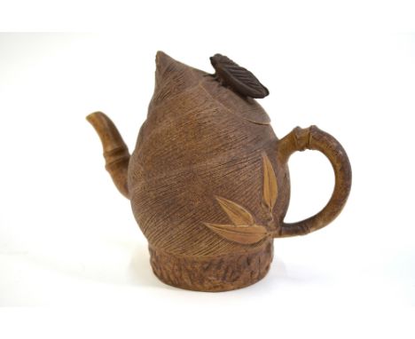 A modern Yixing teapot and cover with cicada (or other invertebrate) finial, modeled in the style of Chen Mingyan; the base w