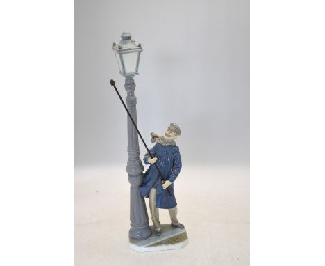 A Lladro model of a gas lamp lighter, 47 cm highBoth thumbs missing&nbsp;