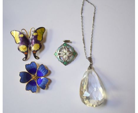 A blue enamel flower brooch, a butterfly enamel brooch, silver Arts &amp; Crafts enamel pendant; large pendeloque faceted cry