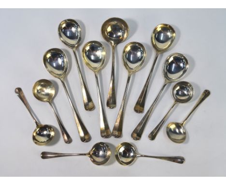 A heavy quality silver set of six Hanoverian rat-tail soup spoons, to/w six matching sundae spoons and a sauce ladle, Harriso