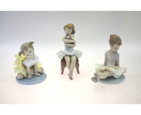 Three Lladro figures:  Oopsy Daisy, 6691, 1999, 12 cm high;  Rosy Posey, 6690, 1999, 13 cm high and First Performance, 6763, 