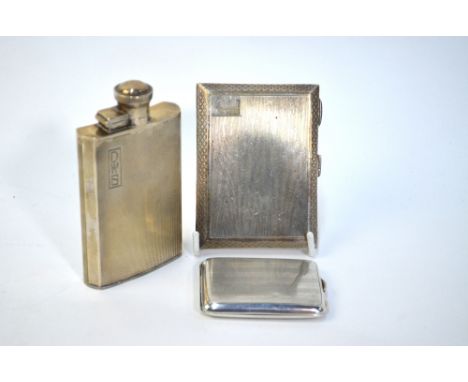 An Art Deco style silver 2ozs hip flask with hinged screw top and engine-turned decoration, James Dixon &amp; Son, Sheffield 