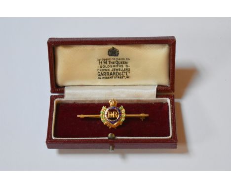 A 9ct yellow gold and polychrome enamel Royal Engineers tie pin, approx 3.9g all in, 4.5 cm long, in box supplied by Garrard 