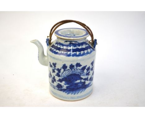 A Chinese blue and white teapot of cylindrical form with circular cover, decorated with floral designs; 15 cm high, 20th Cent