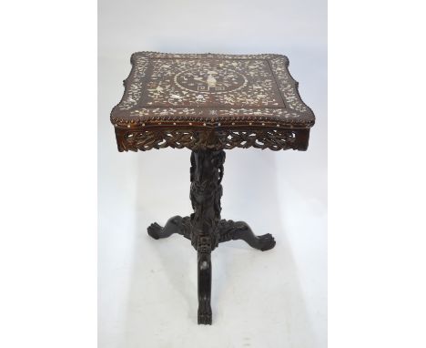 A Vietnamese, or other Asian, mother-of-pearl inlaid table; decorated with a central circular panel surrounded by floral desi