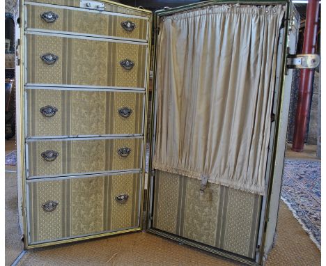 A 1930s steamer trunk with label for Mendel Trunx 'Dust-proof, Warp-proof', with triangular metal tag with 'No.166761 Mendel 