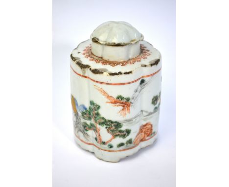 A polychrome enamel tea-caddy of lobed form with domed cover, decorated with rouge-de-fer, grisaille and other colours with a