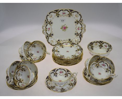 A Coalport tea service, first half of 20th century, simple bat wing style, pattern 6427, comprising six tea plates, cake plat