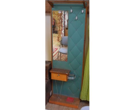 A vintage teak and green vinyl mirror-backed hall stand, circa 1960s