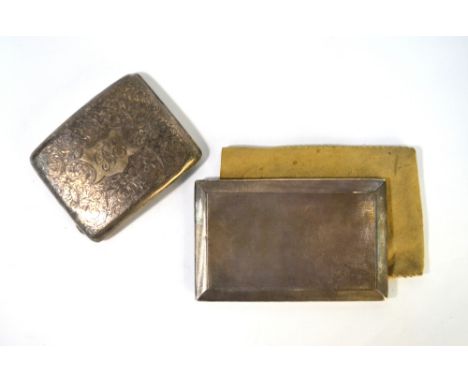 A heavy quality silver engine-turned cigarette case, with sliding hinge, William Neal Ltd., Birmingham 1932, to/w a foliate-e