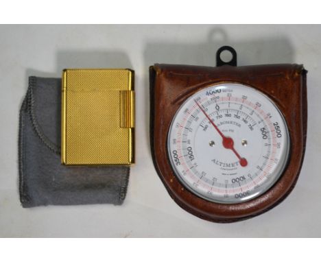 A gold plated Dupont cigarette lighter, to/w a pocket altimeter/barometer in leather case (2)