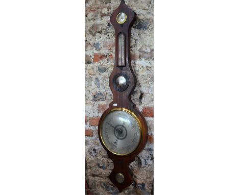 H. Turner, Colchester, a 19th rosewood wheel barometer with silvered dial, thermometer scale, level and convex reflector, 110