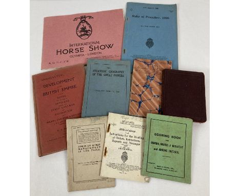 A collection of vintage military issue booklets together with a 1928 International Horse Show progamme and a  hand written 18