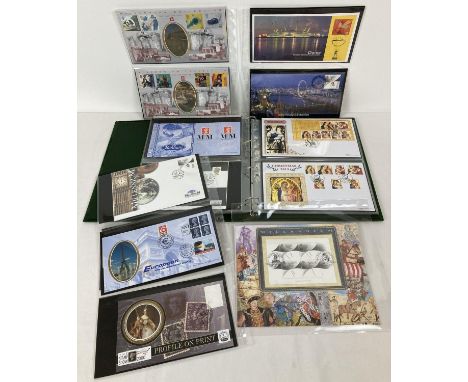 A folder containing 24 Millennium first day covers and 7  Christmas 2013 issue first day covers. Millennium issues to include