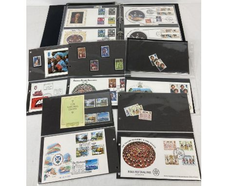 A blue folder containing 45 first day covers with corresponding mint individual  stamps or stamp sets. All dating from 1980-1