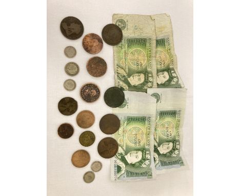 A small collection of antique and vintage British coins and bank notes. To include sovereign heads of George III, IIII, Victo