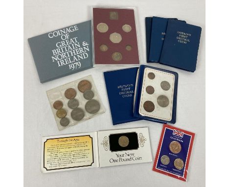 A small collection of vintage British coin sets. To include: Royal Mint 1979 proof set (with folding paper cover), 5 x 'first