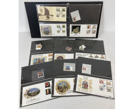 A folder of 34 British first day covers with either mint corresponding individual stamps or collectors stamp sets. Dating 198