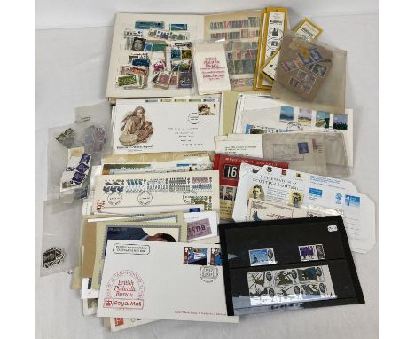 A box of assorted vintage stamps &amp; ephemera. To include: First Day Covers, loose stamps, stamp stock book (full), Mint st