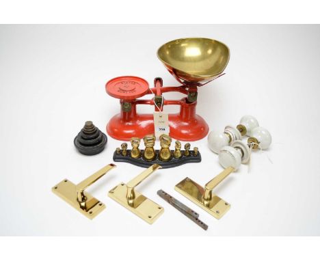 A set of Victor England brass kitchen scales, painted in red; together with a set of Salter brass weights; other weights; thr