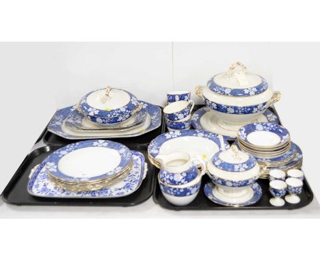 A Spode ‘Cracked Ice and Prunus’ pattern part dinner and tea service, including: circular plates, a tureen with cover, a crea