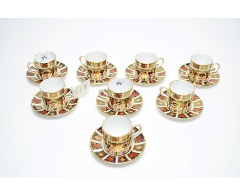 A set of eight Royal Crown Derby ‘Old Imari’ pattern coffee cups and saucers, pattern 1128, various date cyphers. 