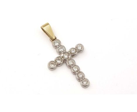 A diamond crucifix pendant, set with eleven round brilliant cut diamonds, in platinum setting, on 18ct yellow gold bale, 27mm