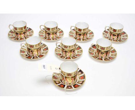 A set of eight Royal Crown Derby ‘Old Imari’ pattern coffee cups and saucers, pattern 1128, various date cyphers. 