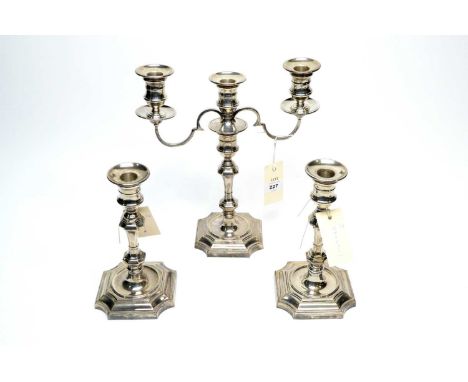A silver two-branch three-light candelabrum and a pair of matching single candle sticks, by Barker Ellis Silver Co, Birmingha