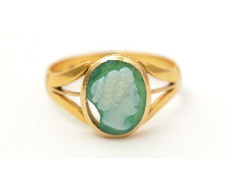 A Victorian Grecian Revival hardstone cameo ring, the banded agate decorated with a female bust, in 22ct yellow gold, Birming