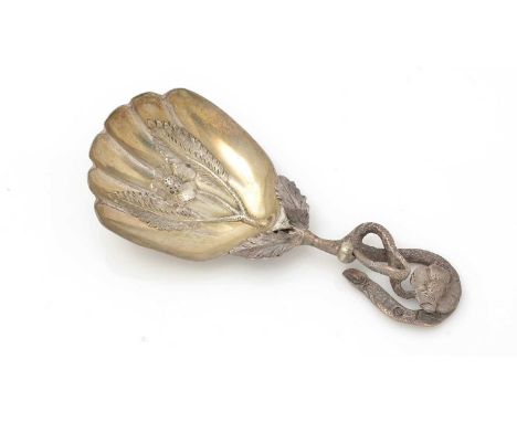 A Victorian silver caddy spoon, with a gilt, fan-shaped bowl chased with a flower, and a tendril stem with a flower and a fru
