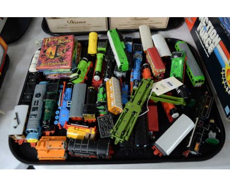 A selection of Thomas The Tank Engine and Friends model trains by Ertl; together with a collection of children's books illust